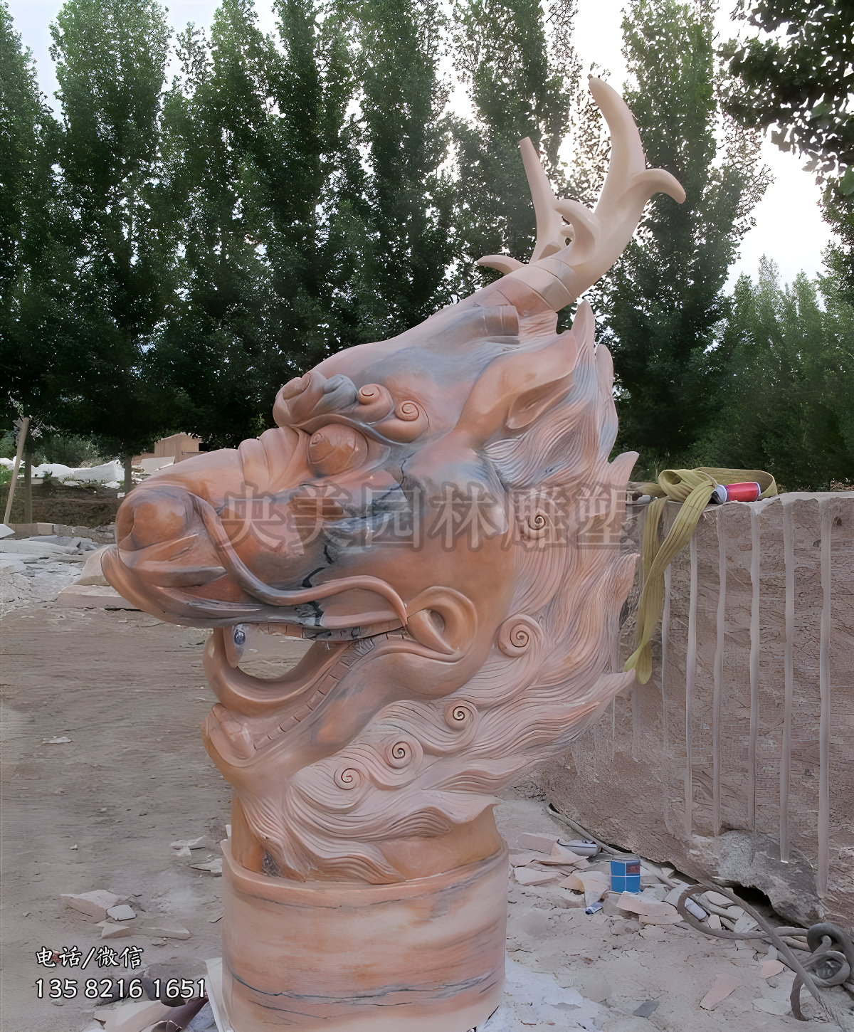 晚霞红赢博手机网页版登录入口龙头雕塑